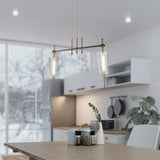 VONN Artisan Toscana 29" Integrated LED Pendant VAP2102AB over a table