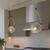 VONN Artisan Firenze 8-inch Antique Brass LED Pendant over kitchen island