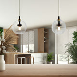 VONN Portofino 7" LED Pendant with Glass Ball Shade over a counter