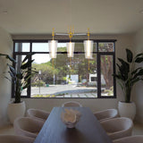 VONN Artisan Toscana 26" Integrated LED Pendant VAP2103AB over table