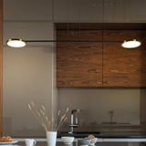 VONN Artisan Torino 39-inch Antique Brass LED Pendant over kitchen