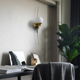 VONN Chianti 30-inch Antique Brass Wall Sconce in the study room