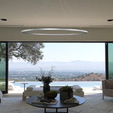 VONN Tania 60-inch Silver LED Ring Chandelier hovering in modern villa