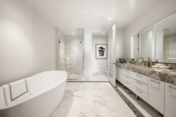 The Millennium Residences Shine Bright with VONN Lighting's LED Mirrors and Cabinets